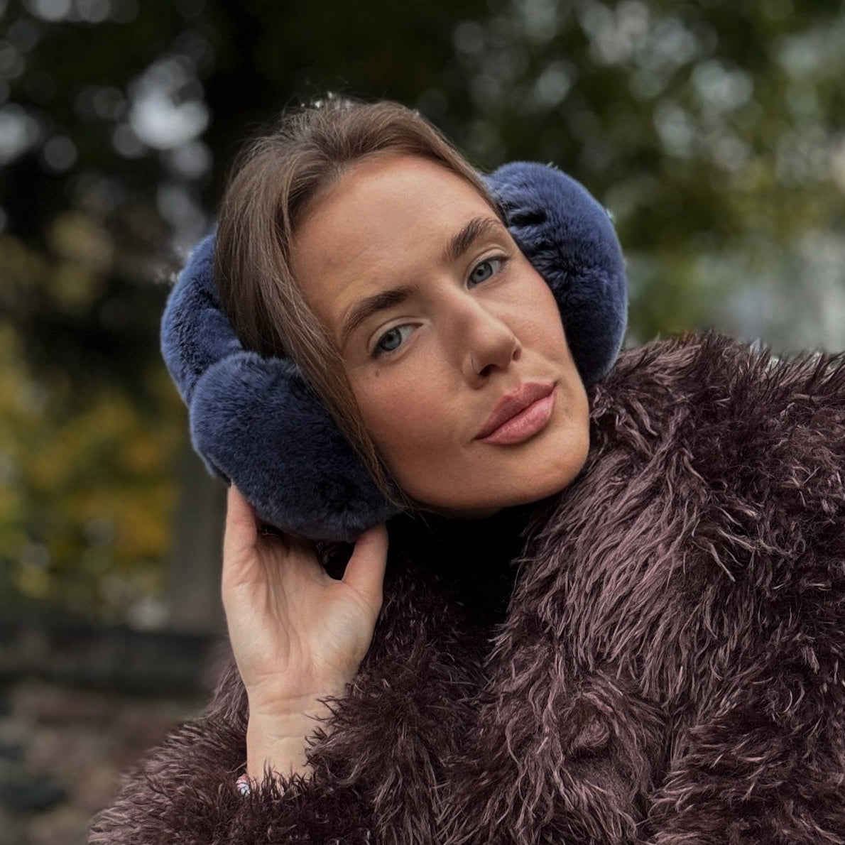 Minkštos natūralaus kailio ausinės